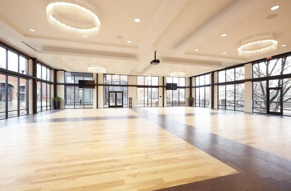 Large commercial event space with a polished floor