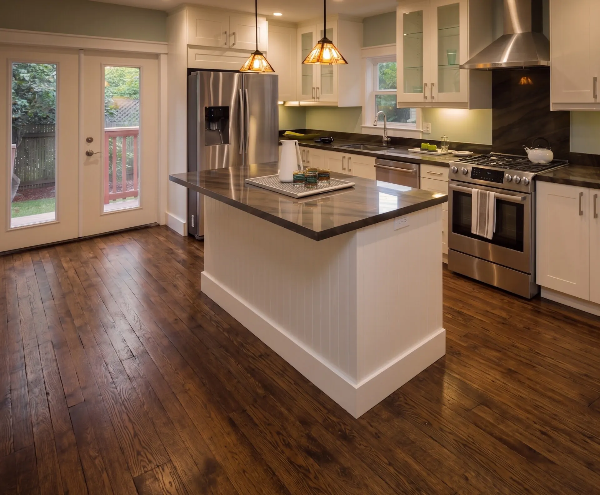 Worn dark hardwood in that kitchen before the laminate went in