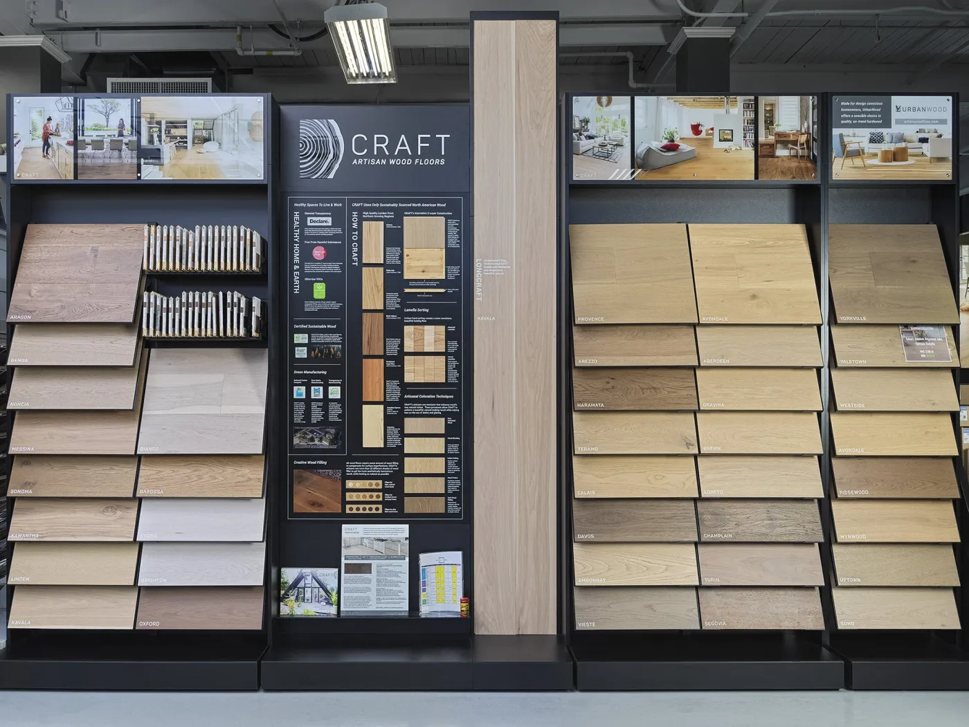 Wall of engineered hardwood flooring samples on display