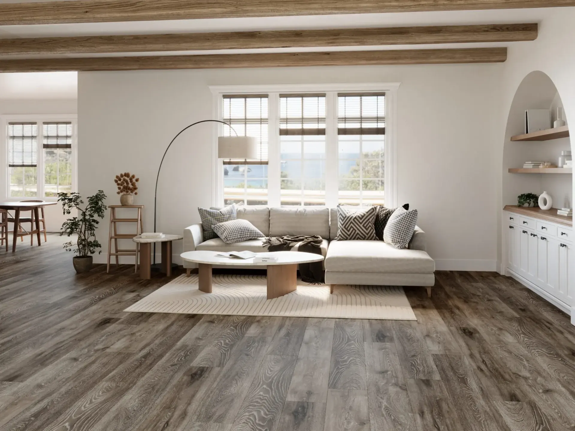 Wide grey-brown planks across an open living room