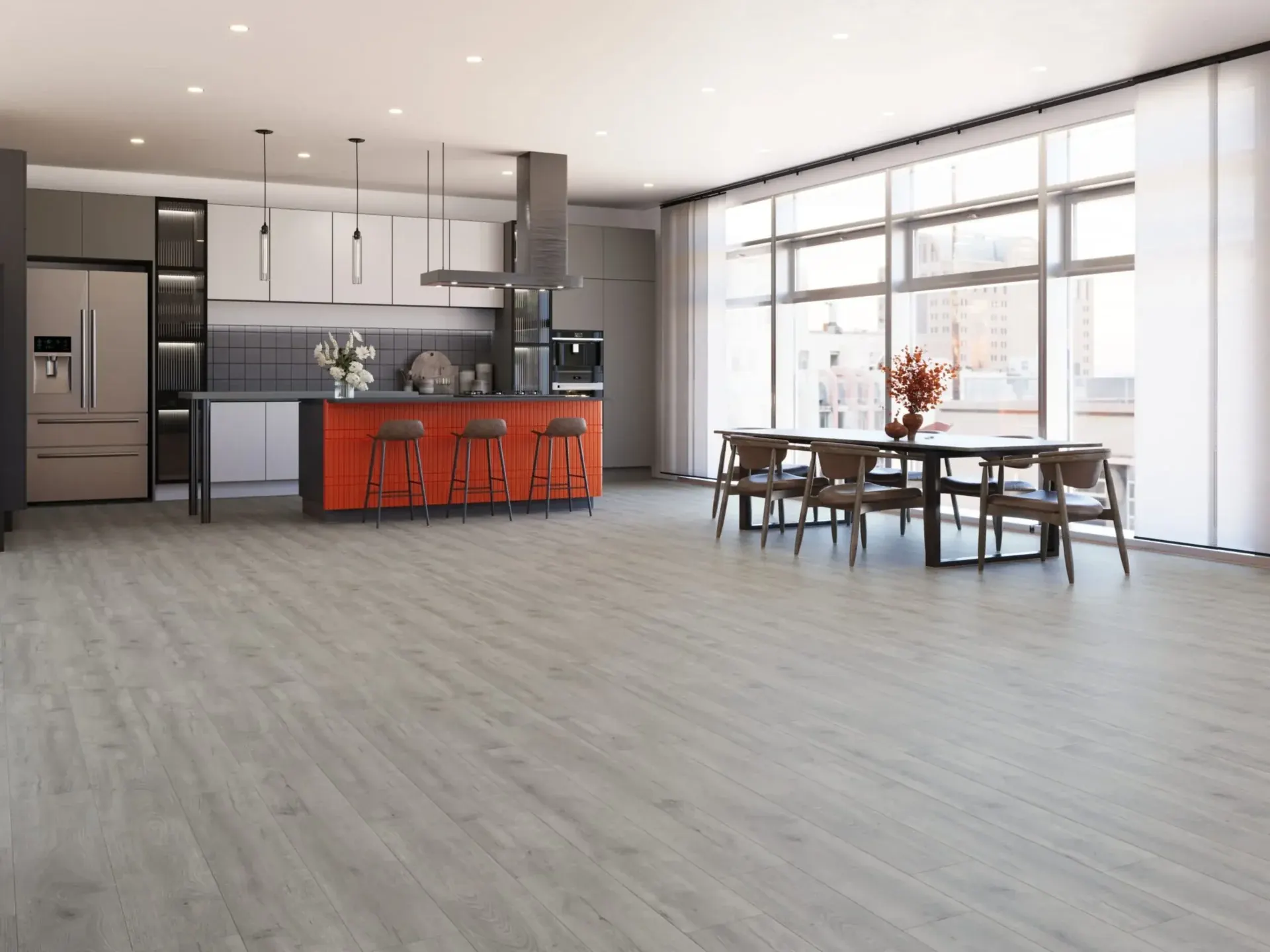 Pale oak-look planks running through an open kitchen and dining area