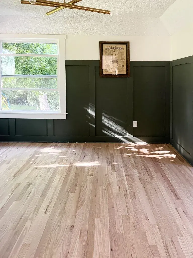 Hardwood floor after refinishing, in a sunlit room