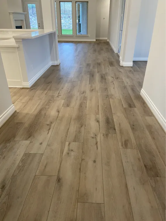 Hallway laid in warm grey laminate planks