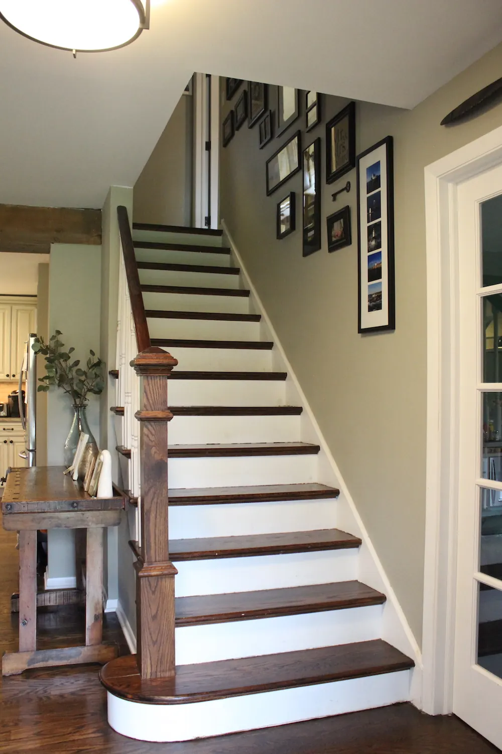 Dark recapped treads above white risers