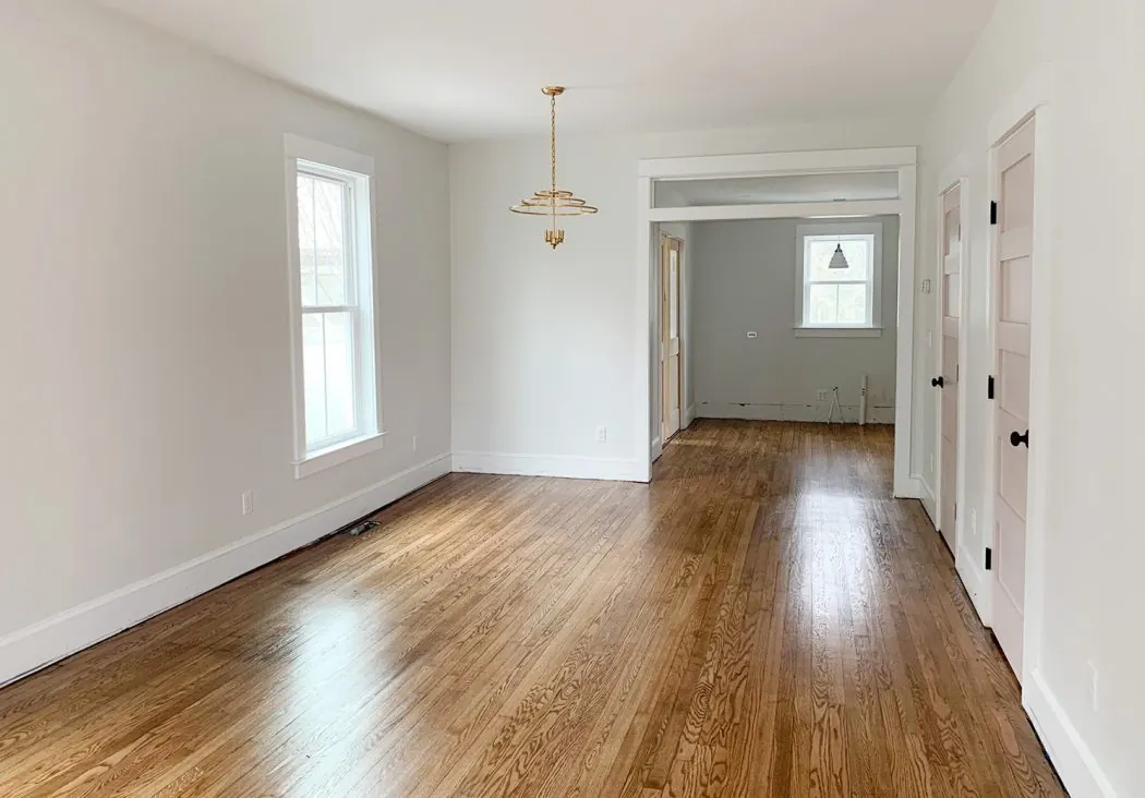 Bright dining room with a refinished hardwood floor