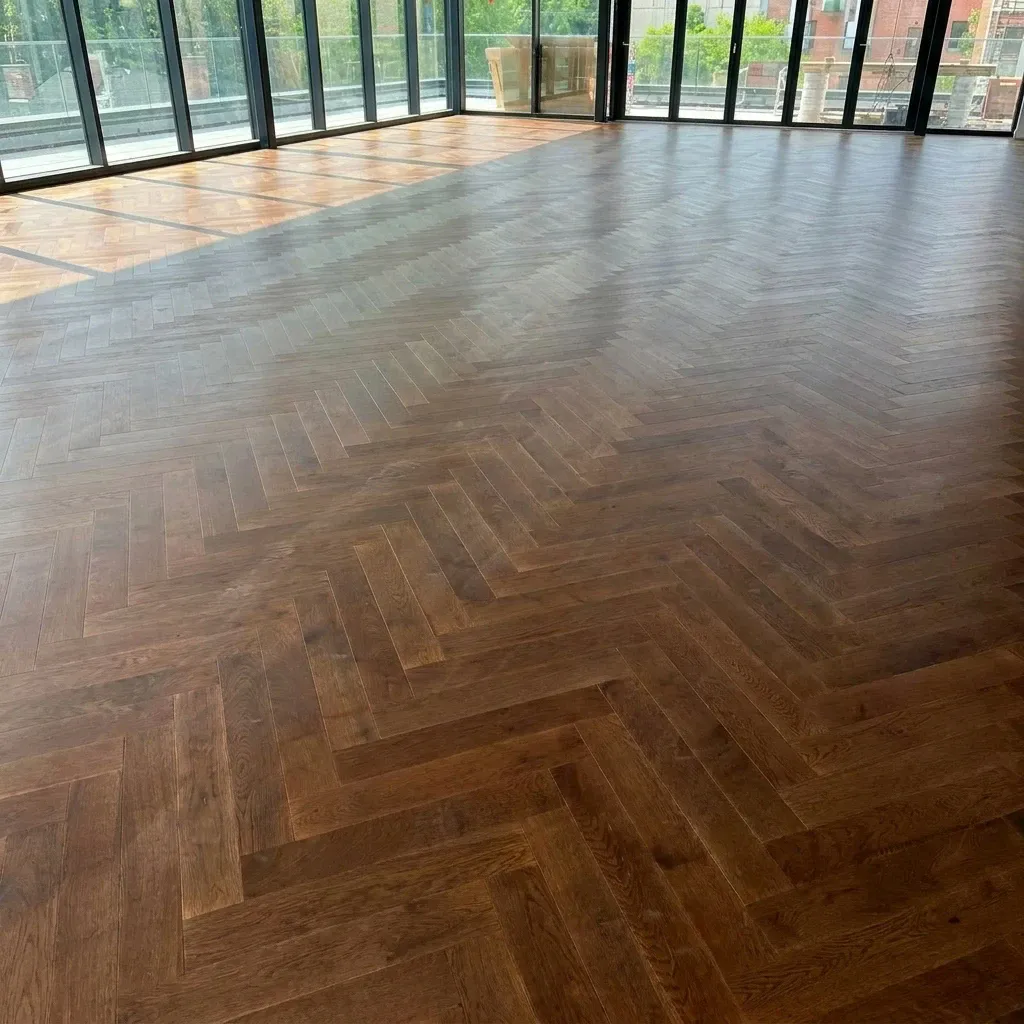 Herringbone Engineered Hardwood – Open-Concept Space