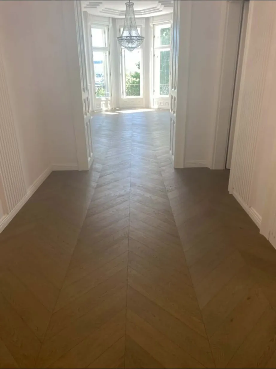 Chevron Engineered Hardwood – Hallway & Bay Room